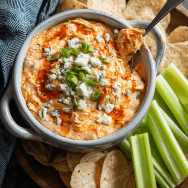 Spicy Buffalo Chicken Dip with Creamy Cheddar & Blue Cheese Crumble