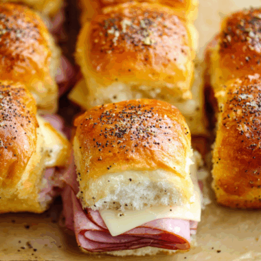 Melt-in-Your-Mouth Ham & Swiss Sliders with Buttery Poppy Seed Glaze