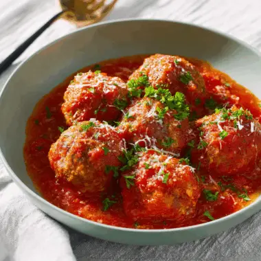 Savory Parmesan-Stuffed Italian Meatballs, Baked to Perfection