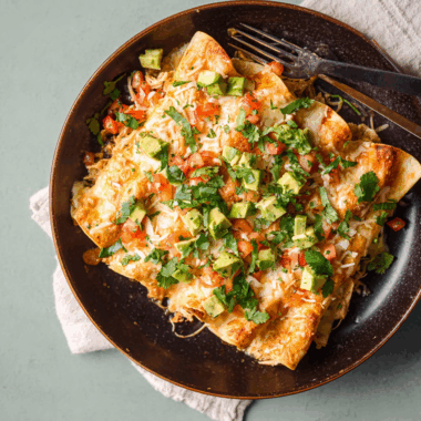 Cheesy Rotisserie Chicken Enchiladas with Green Chile Sauce