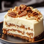 Swirled Carrot Cake Cheesecake with Cream Cheese Frosting and Caramelized Pecans