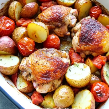 Healthy One Pan Baked Paprika Chicken Thighs with Potatoes and Tomatoes