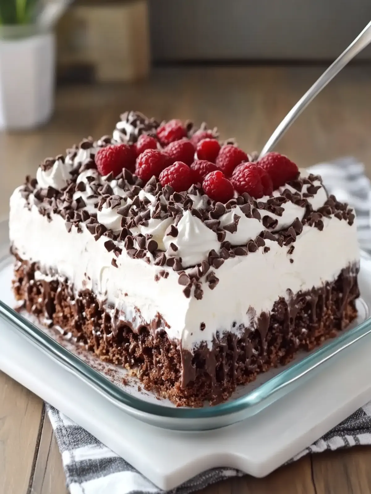 Indulge in 3-Ingredient Triple Chocolate Cool Whip Poke Cake 5 3-Ingredient Triple Chocolate Cool Whip Poke Cake