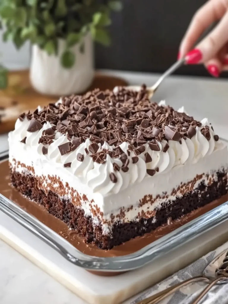 Indulge in 3-Ingredient Triple Chocolate Cool Whip Poke Cake 4 3-Ingredient Triple Chocolate Cool Whip Poke Cake